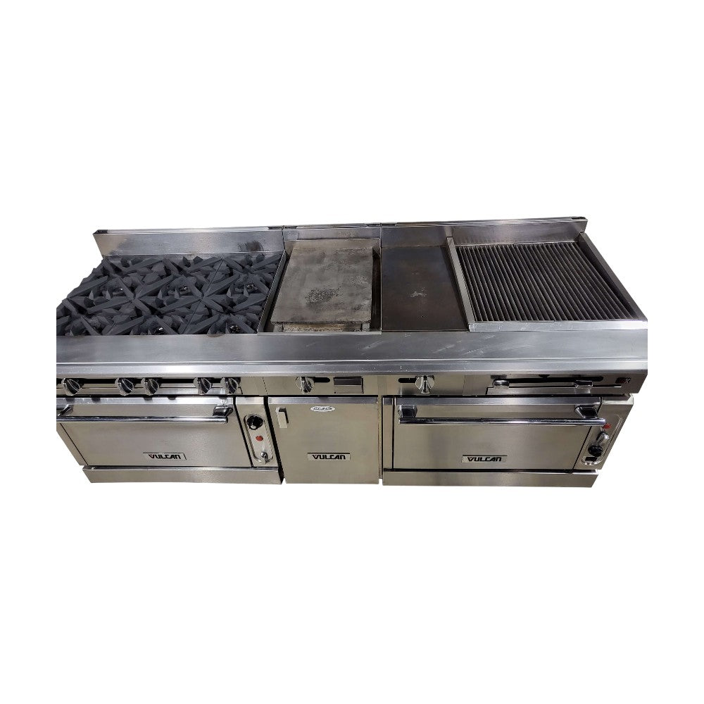 Vulcan VC0136-500 Custom Range: 6 Burners / 15-in Griddle / 12-in Hotplate / 24-in Char / Double Oven