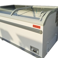 New Air NIF-56-CG 56in Curved Glass Island Freezer